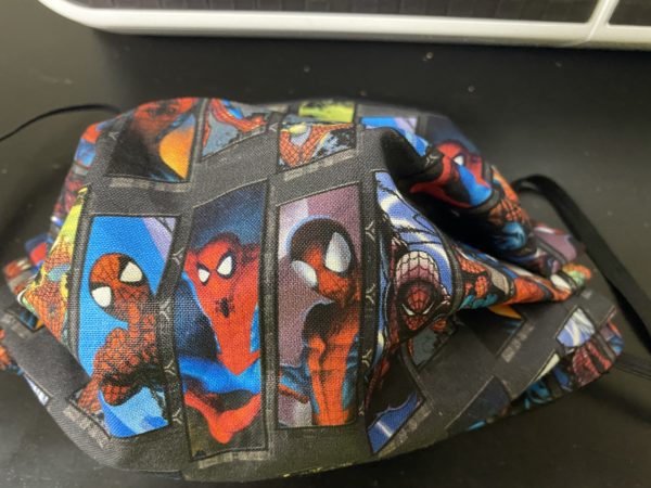 Swatches Spider-Man Face Mask - This Spider-Man face mask has various poses of Spider-Man on it. #SpiderMan