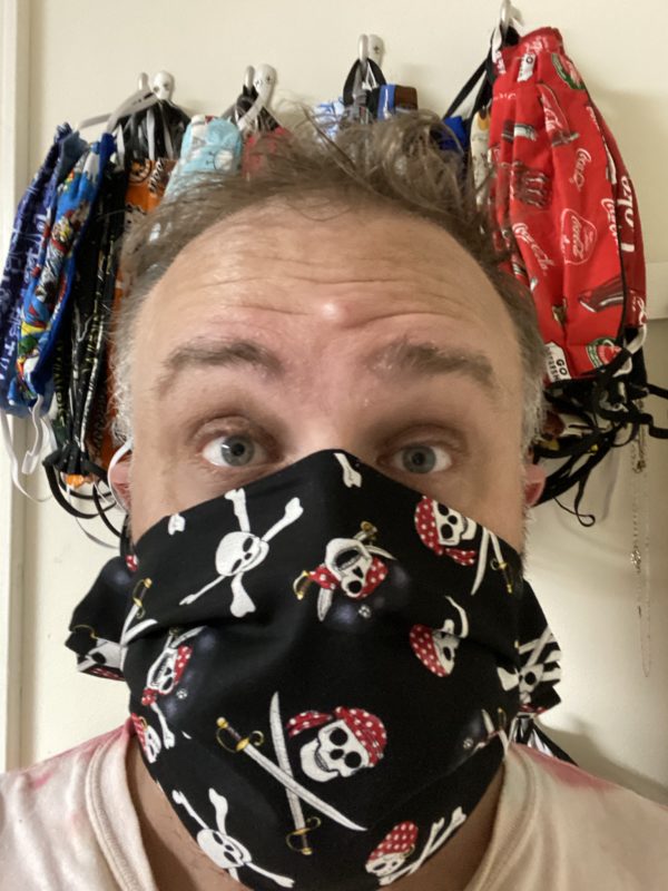 Pirate Face Mask - this face mask has crossbones and skulls on it. #Pirates