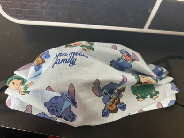 Lilo & Stitch Face Mask - This face mask has both Lilo and Stitch on it and says Ohana means family on it. #Lilo #Stitch #Ohana