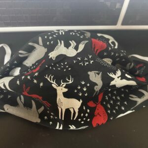 Forest Animals Face Mask - a face mask with forest animals and their tracks.