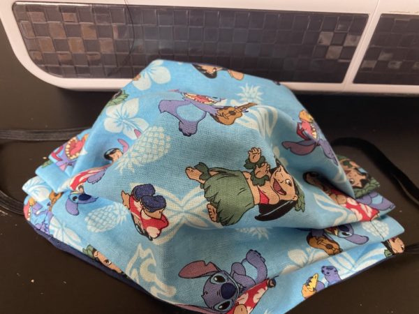 Lilo & Stitch Face Mask a face mask with both Lilo and Stitch on it. #Lilo #Stitch #LiloStitch
