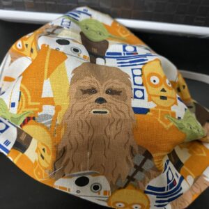 Star Wars Face Mask - A Star Wars Themed Face mask with some of the Star Wars Characters on it. #StarWars