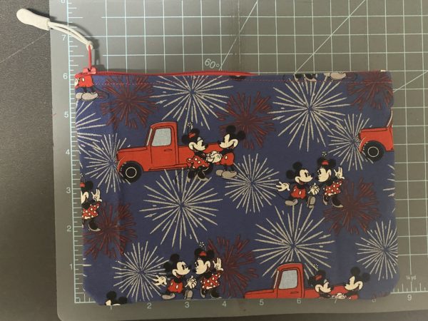 Mickey & Minnie Mouse Zipper Pouch a Zipper Pouch with Mickey Mouse and Minnie Mouse on it. #MickeyMouse #MinnieMouse