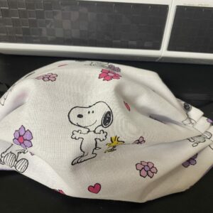 Spring Snoopy Face Mask - A Spring themed face mask with Snoopy and Woodstock with flowers and hearts.