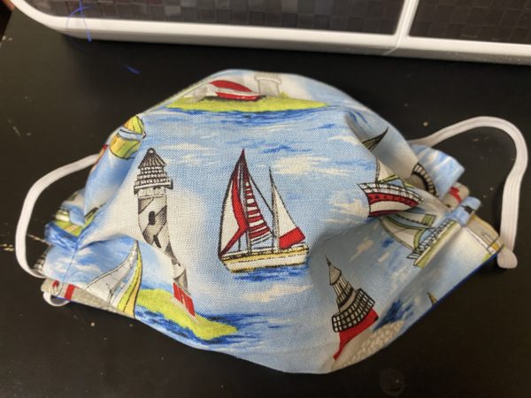 Sailboats and Lighthouses Face mask - a great nautical themed face mask with sailboats and lighthouses on it. #Lighthouses #Sailboats #Nautical