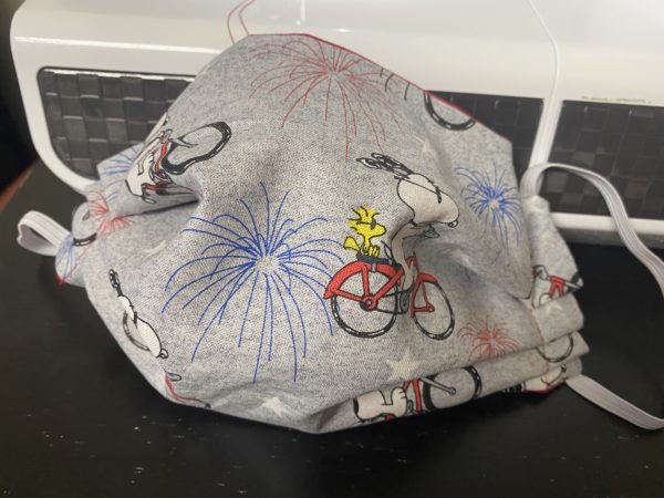 Snoopy & Woodstock on a Bicycle with Fireworks Face Mask - A 4th of July Patriotic Face Mask with Snoopy and Woodstock on it. #Snoopy #Woodstock