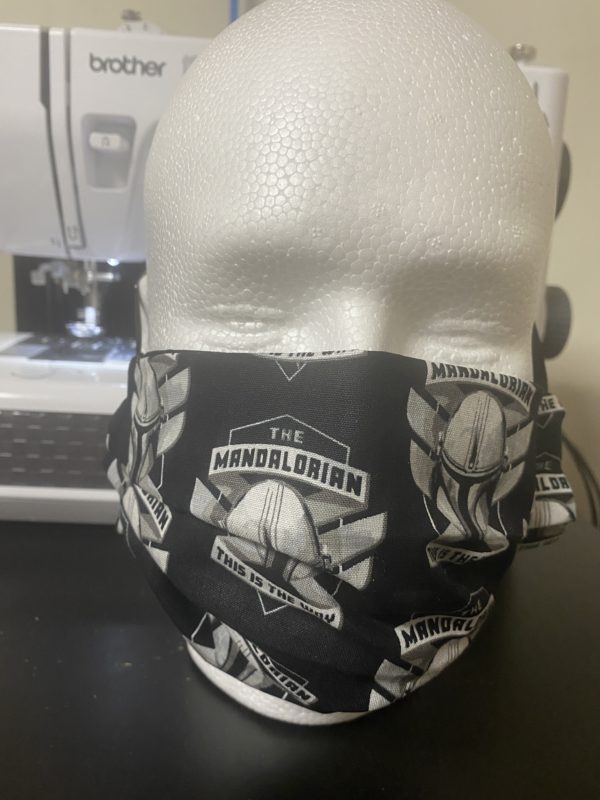 Mandalorian Helmet Face Mask - This Star Wars Mandalorian face mask has Mondo's helmet on it and the words "This is the Way" on it. #Mandalorian
