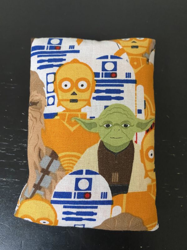Star Wars Pocket Tissue Holder - A pocket tissue holder with some of the Star Wars Characters on it. #StarWars