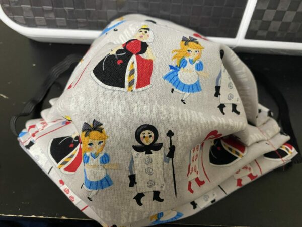 Queen of Hearts Face Mask - The Queen of Hearts and Alice from Alice in Wonderland all on a face mask! #QueenofHearts #AliceinWonderland