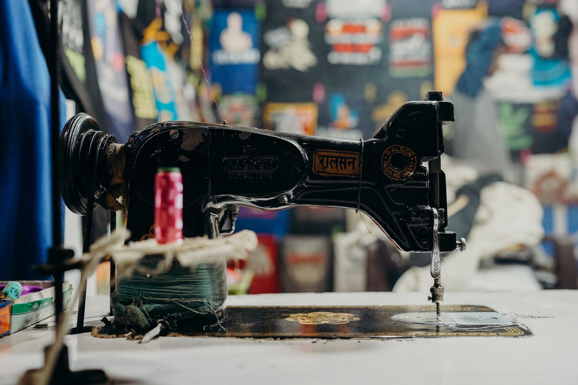 Antique Sewing Machine - National Sewing Machine Day - a day to honor that machine that is used to attach things to together like fabric. #SewingMachineDay (Pexel Photo by CottonBro) 