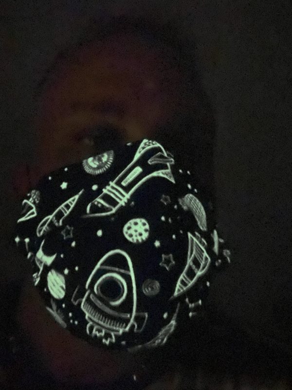 Glow-in-the-Dark Outer Space Face Mask - This face mask is out of this world and it even glows in the dark. #glowinthedark #outerspace #spaceship #stars #planets