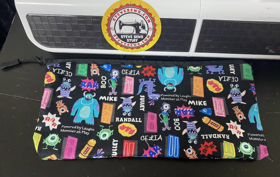 Monsters Inc Zipper Pouch - this is a zipper pouch with the gang from Monsters Inc on it. #MonstersInc #ZipperPouch