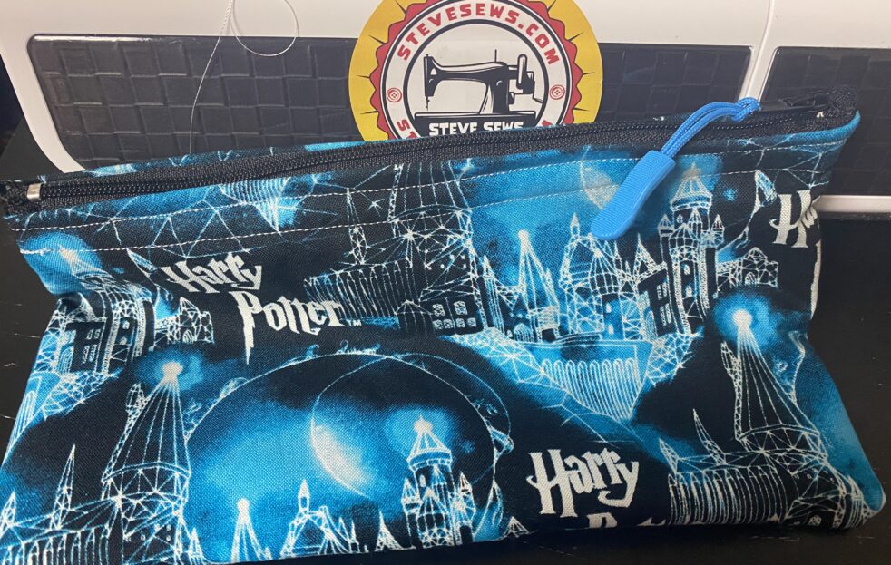Hogwarts Zipper Pouch - this Harry Potter zipper pouch has the Hogwarts Castle on it from Hogwarts School of Witchcraft and Wizardry. #Hogwarts #HarryPotter