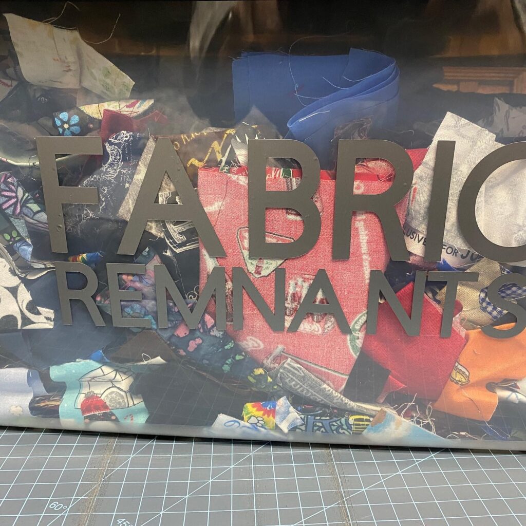 Scrap fabric - fabric remnants- plastic tote 