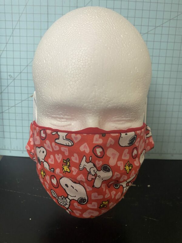 Hearts with Snoopy and Woodstock Face Mask - Here is a face mask with Snoopy and Woodstock and tons of hearts, great for Valentine's Day. #ValentinesDay #Snoopy #Woodstock