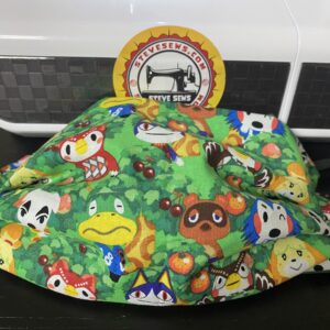 Animal Crossing Face Mask - a face mask with the animals from Animals Crossing on it. #AnimalCrossing