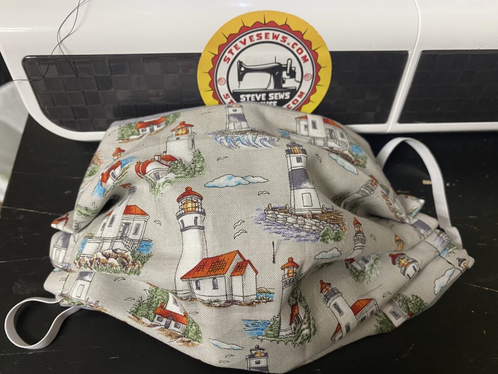 Lighthouses Face Mask - a face mask with lighthouses on it. #Lighthouse #Lighthouses