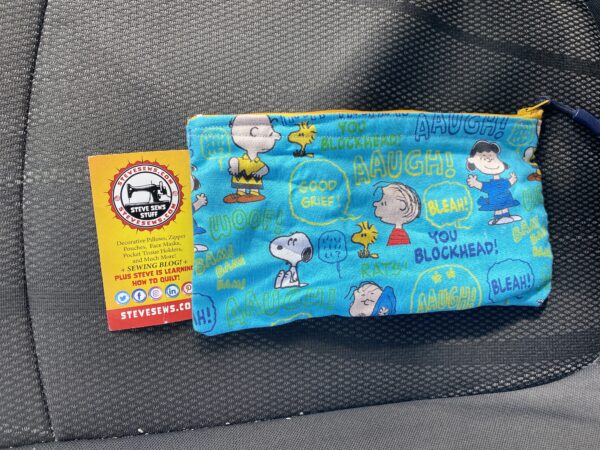 Peanut Gang with Sayings Zipper Pouch – this face mask has some of the Peanuts Gang and sayings on it. #Snoopy #CharlieBrown