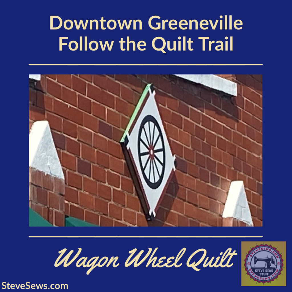 Wagon Wheel - a quilt block on the Downtown Greeneville Follow the Quilt Trail. #QuiltTrail #GreenevilleTN #WagonWheel