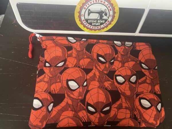 SpiderMan Zipper Pouch - a Red, Black, and White zipper pouch with SpiderMan's face on it. #SpiderMan #Zipper Pouch