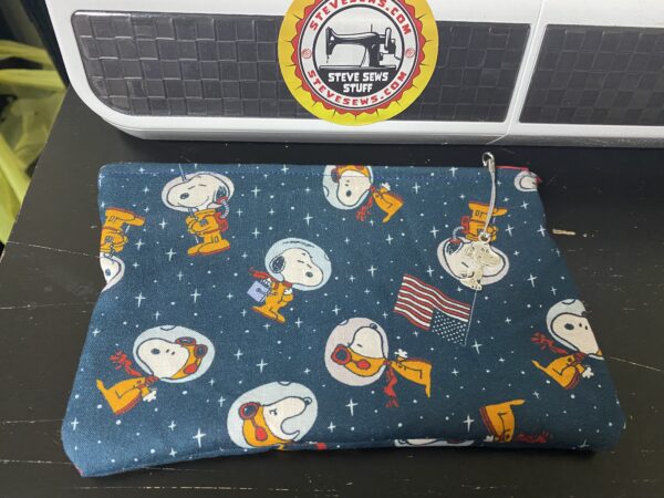 Snoopy in Space Zipper Pouch - This Zipper Pouch features the famous beagle, Snoopy in Space, the Astronaut Snoopy. With a Snoopy Zipper Pull. #Snoopy #SnoopyInSpace #AstronautSnoopy #Astronaut #Snoopy