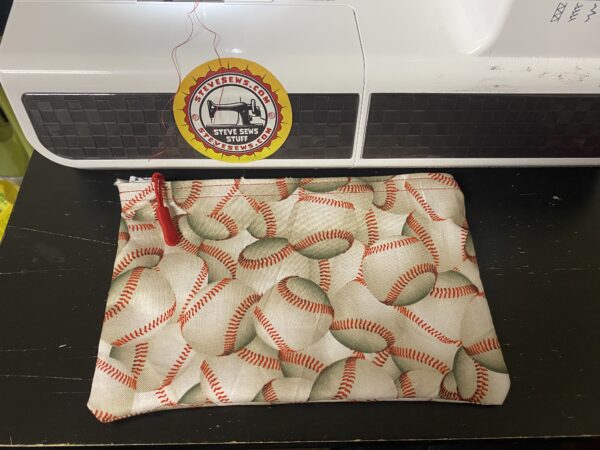 Baseball Zipper Pouch - a zipper pouch with baseballs on it. #Baseball