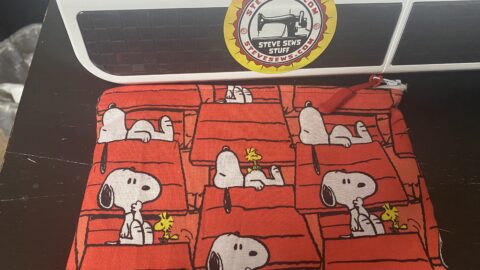 Snoopy and Doghouse Zipper Pouch - this zipper pouch has Snoopy and his doghouse on it. #Snoopy #Doghouse #ZipperPouch