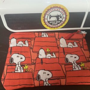 Snoopy and Doghouse Zipper Pouch - this zipper pouch has Snoopy and his doghouse on it. #Snoopy #Doghouse #ZipperPouch