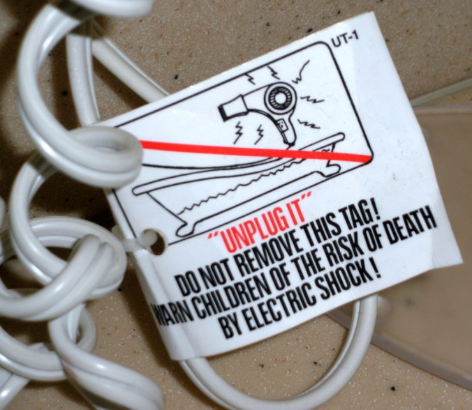 “UNPLUG IT” DO NOT REMOVE THIS TAG! WARN CHILDREN OF THE RISK OF DEATH BY ELECTRIC SHOCK!