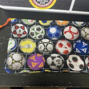 Soccer Zipper Pouch this zipper pouch has game plays and soccer balls on it. Great for anyone who loves soccer. #soccer