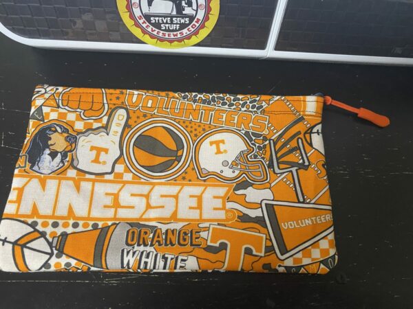 Tennessee Vols Zipper Pouch is a zipper pouch with all kinds of Tennessee Vols stuff on it. #Vols #GoVols #VFL