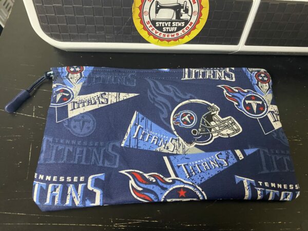 Tennessee Titans Zipper Pouch - a zipper pouch featuring the Tennessee Titans. #Titans #TennesseeTitans #TitansFootball