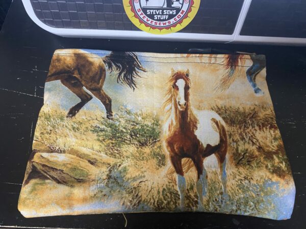 Horse Zipper Pouch is a zipper pouch with horses on it. #Horse #Horses