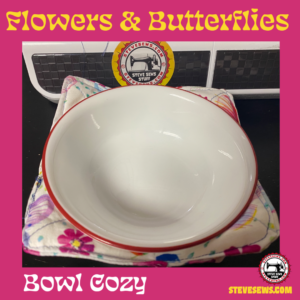 Flowers and Butterflies Bowl Cozy is a bowl cozy with flowers and butterflies on it. #Flowers #Butterflies #Butterfly