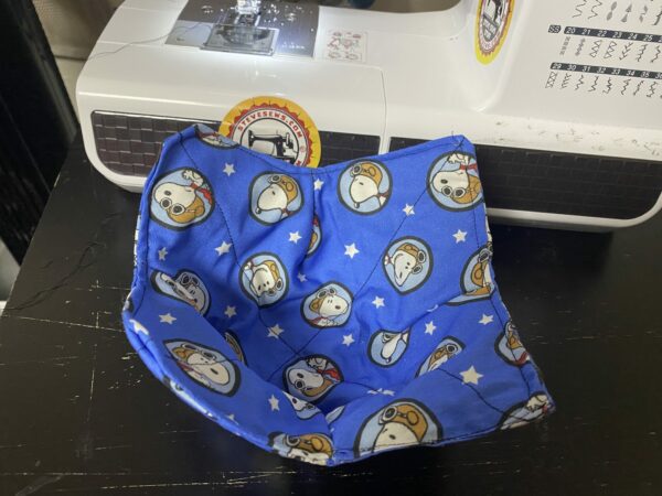 Snoopy Flying Ace Bowl Cozy - a bowl cozy that features Snoopy as the World War I Flying Ace. #WorldWarIFlyingAce #FlyingAce #Snoopy
