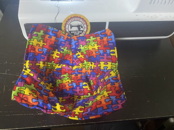 Autism Awareness Bowl Cozy is a bowl cozy with colorful puzzle pieces the symbol for autism awareness and autism acceptance. #AutismAwareness #AustismAcceptance
