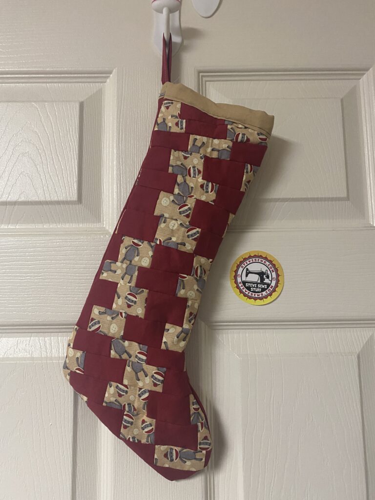 Quilted Christmas Stocking - I made this custom stocking doing quilt blocks. 