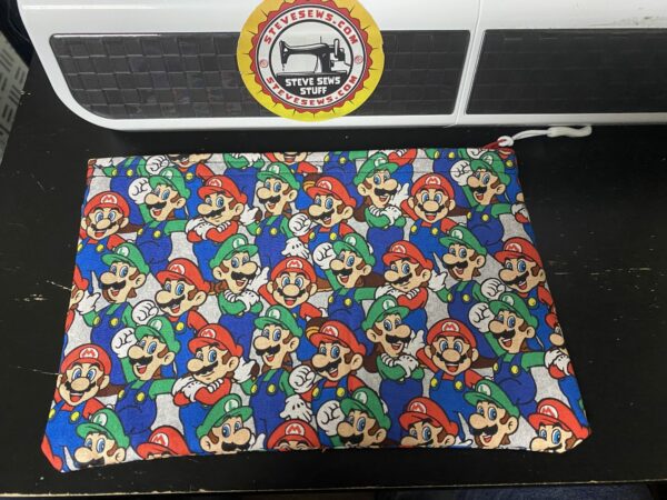 Mario Brothers Zipper Pouch - the Super Mario Brothers, Mario, and Luigi are featured on this zipper pouch. #Mario #MarioBrothers #Luigi #Nintendo #SuperMarioBrothers