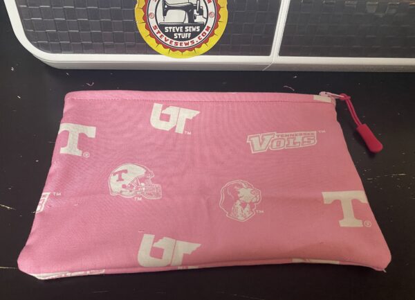 Pink Vols Zipper Pouch - this zipper pouch is pink in color and shows off the University of Tennessee Volunteers. #GoVols #VFL #UTK #BigOrange