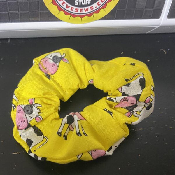 Holstein Cow Scrunchie is a Scrunchie with a yellow background and Holstein cows on it. #Holstein #HolsteinCow