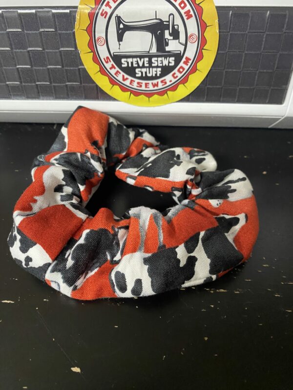 Holstein Cow Scrunchie is a Scrunchie with a red background and Holstein cows on it. #Holstein #HolsteinCow