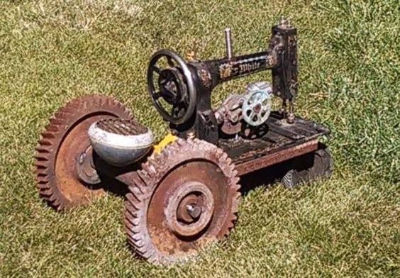 Sewing Machine Tractors - check out these tractor sculptures made with sewing machine parts. 