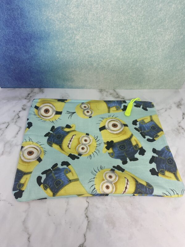 Minions Zipper Pouch - A light blue zipper pouch with the Minions on it. #Minions