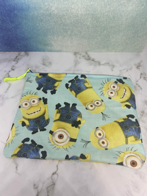 Minions Zipper Pouch - A light blue zipper pouch with the Minions on it. #Minions