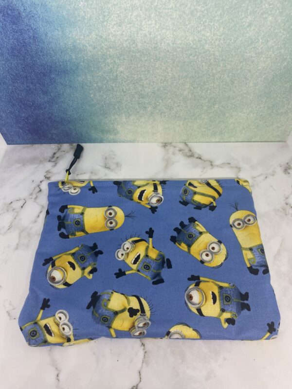 A Medium blue zipper pouch with the Minions on it. #Minions