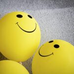 Yellow Smiley Emoji on Gray Surface