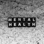 a black and white photo of the word mental health