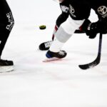 people playing ice hockey