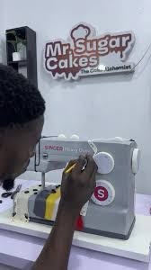 Sewing Machine Cake — Cake Artist, Mr. Sugar Cakes creates a Singer Heavy Duty Sewing Machine cake. #MrSugarCakes #SingerSewingMachine